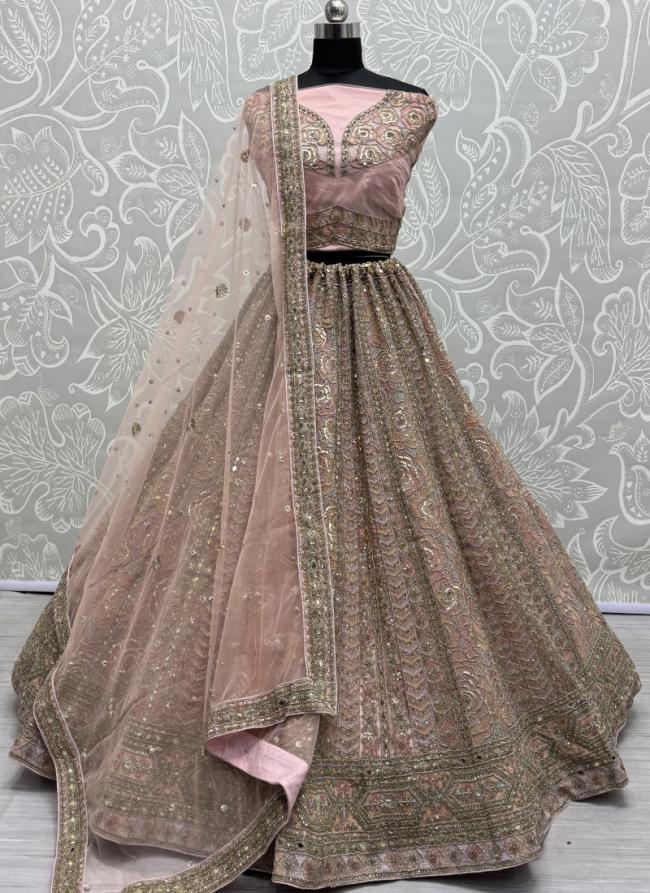 Net Peach Party Wear Embroidery Work Lehenga Choli